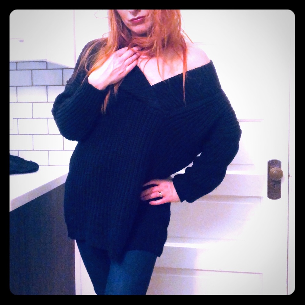 Black, oversized sweater. Sexy off-the-shoulder!